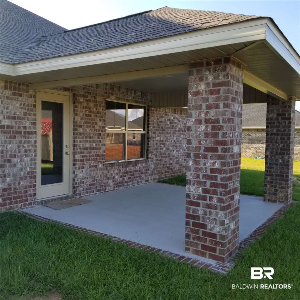 14606 Troon Drive Foley, AL 36535 - Photo 4 of 18 All brick, covered back porch, hurricane shutters
