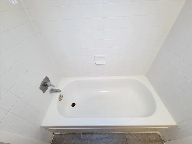 a bathroom with a bathtub