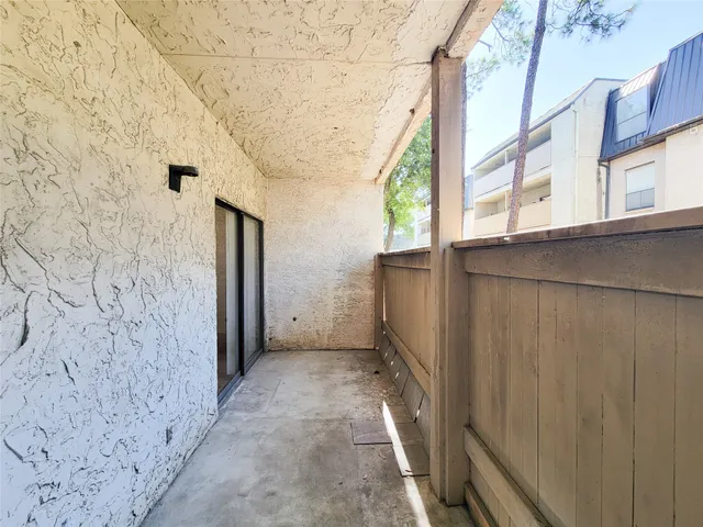 a view of a back yard of the house