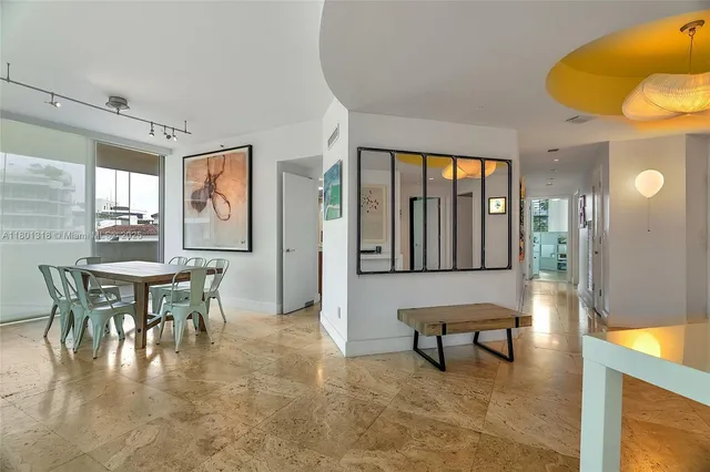 a view of a livingroom with furniture and window