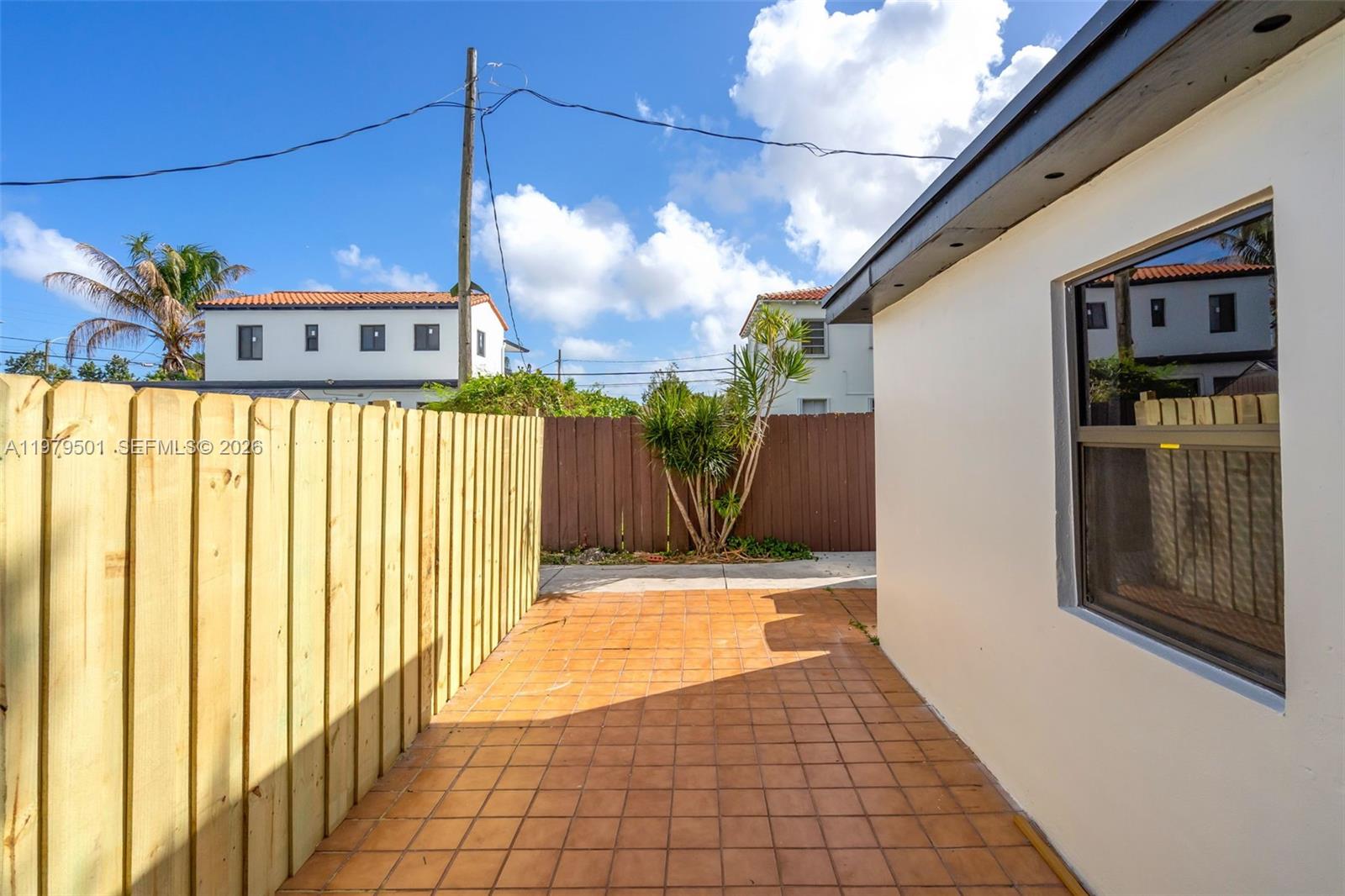 130 Southwest 31st Court, Unit 2 Miami, FL 33135 - Photo 13 of 14 a view of a house with a porch