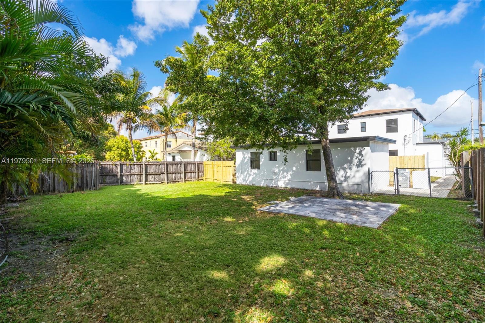 130 Southwest 31st Court, Unit 2 Miami, FL 33135 - Photo 14 of 14 a view of a yard with a house and garden