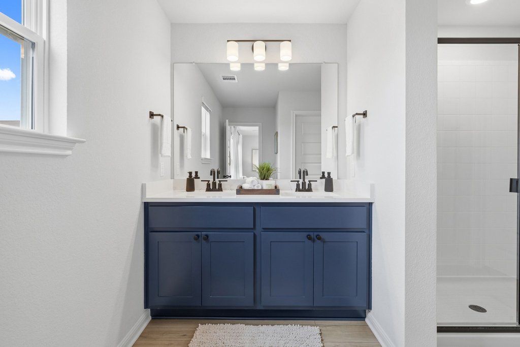 8001 Andravida Drive Austin, TX 78747 - Photo 21 of 35 Spacious primary bath with dual vanity and walk-in shower