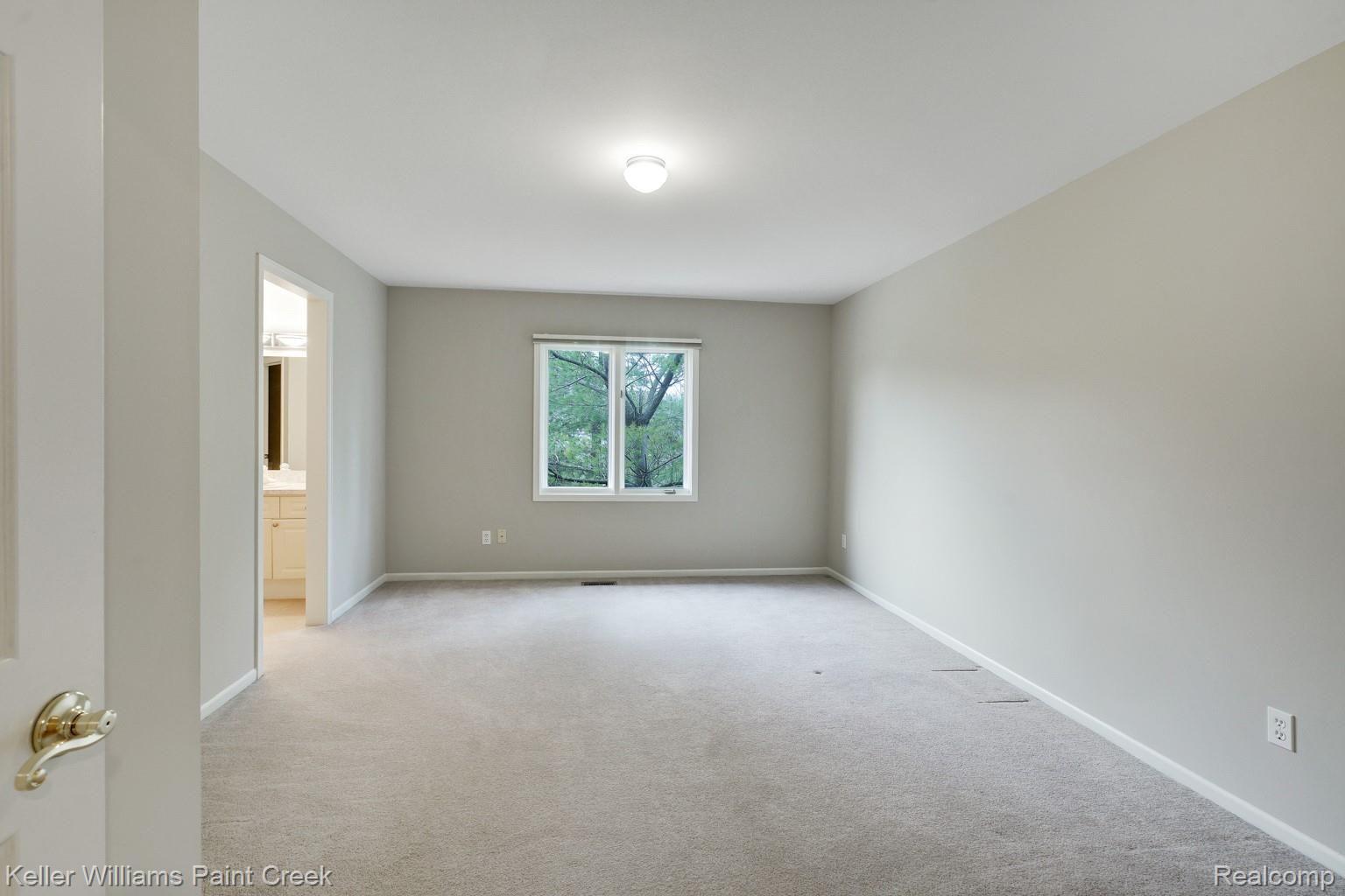 3473 Moceri Court Rochester, MI 48306 - Photo 43 of 58 Large Bedroom with shared Bath with a beautiful view