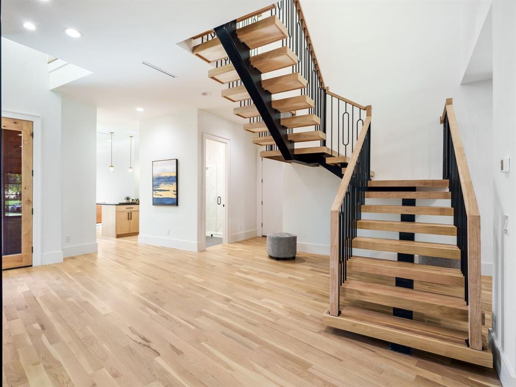 4010 Sperry Street Dallas, TX 75214 - Photo 13 of 40 Stairway with wood finished floors and recessed lighting