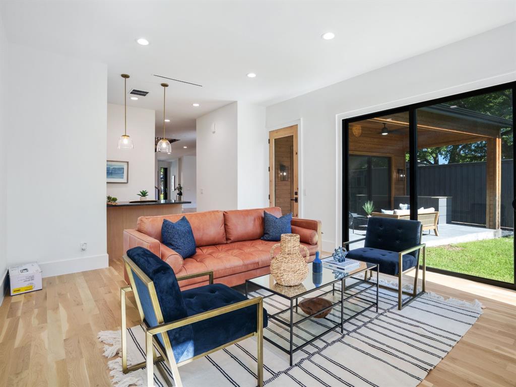4010 Sperry Street Dallas, TX 75214 - Photo 15 of 40 Living area with light wood finished floors and recessed lighting
