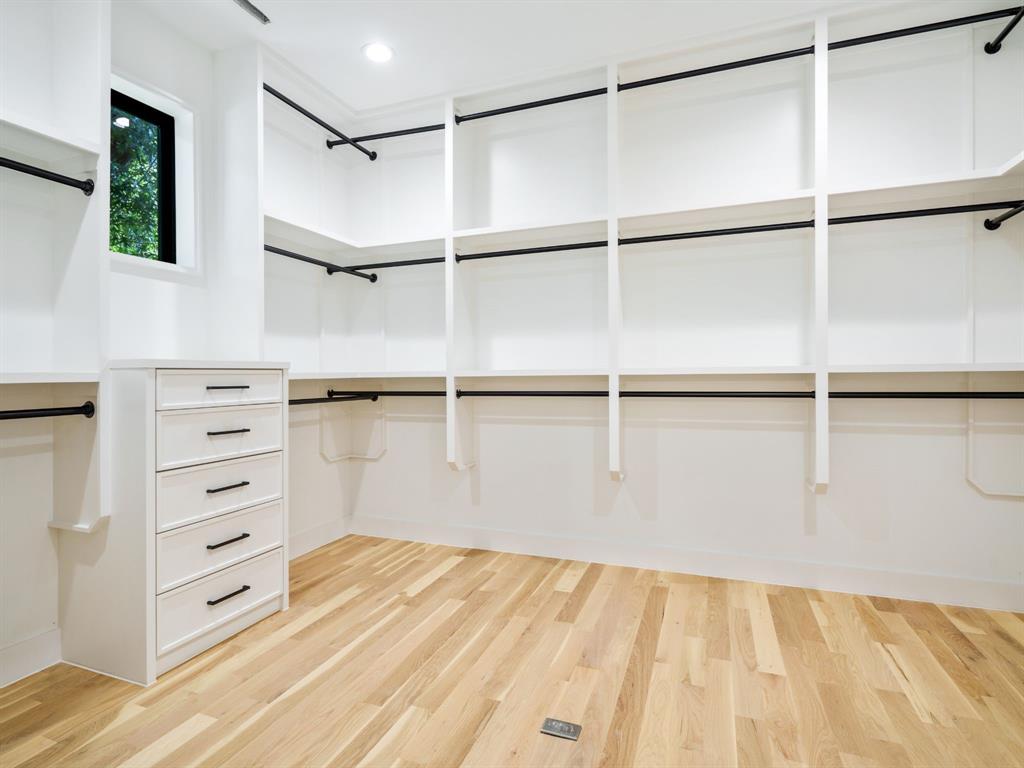 4010 Sperry Street Dallas, TX 75214 - Photo 28 of 40 Walk in closet with light wood-style flooring