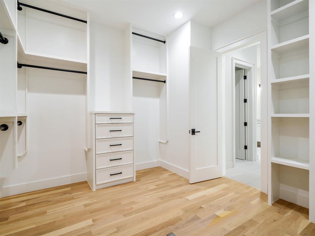 4010 Sperry Street Dallas, TX 75214 - Photo 29 of 40 Walk in closet featuring light wood-type flooring