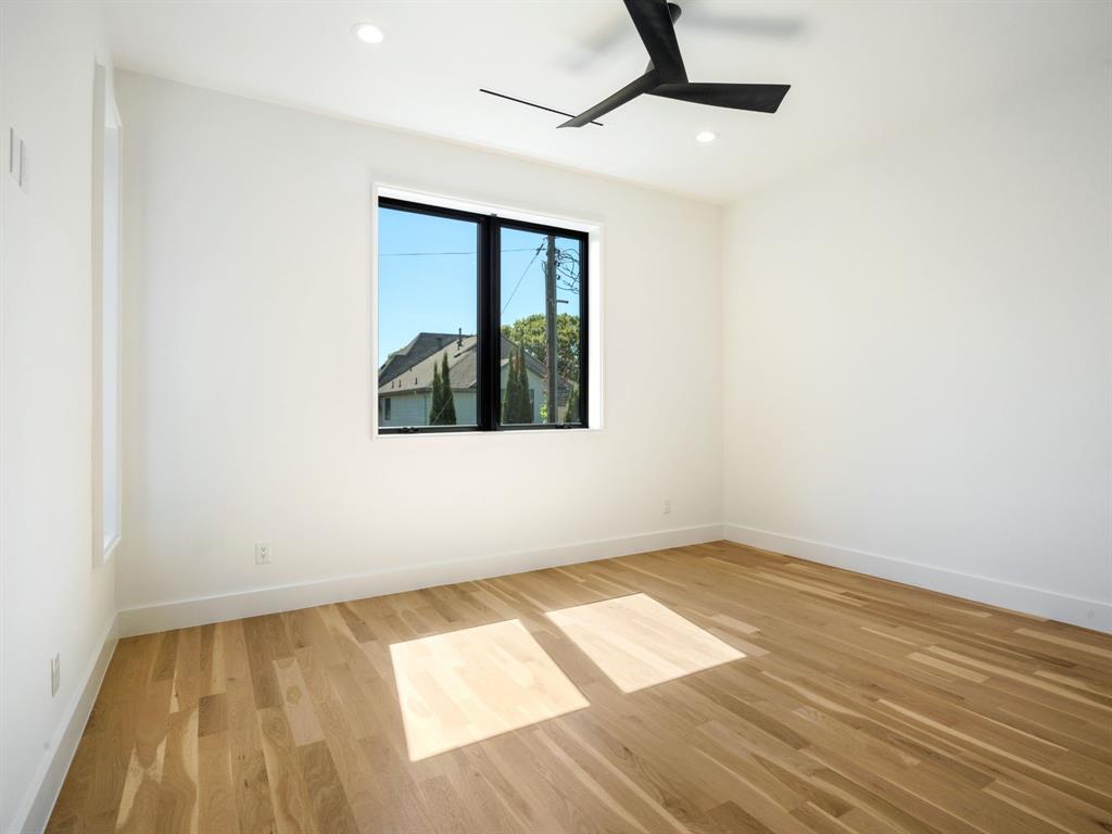 4010 Sperry Street Dallas, TX 75214 - Photo 32 of 40 Unfurnished room featuring light wood finished floors, ceiling fan, and recessed lighting
