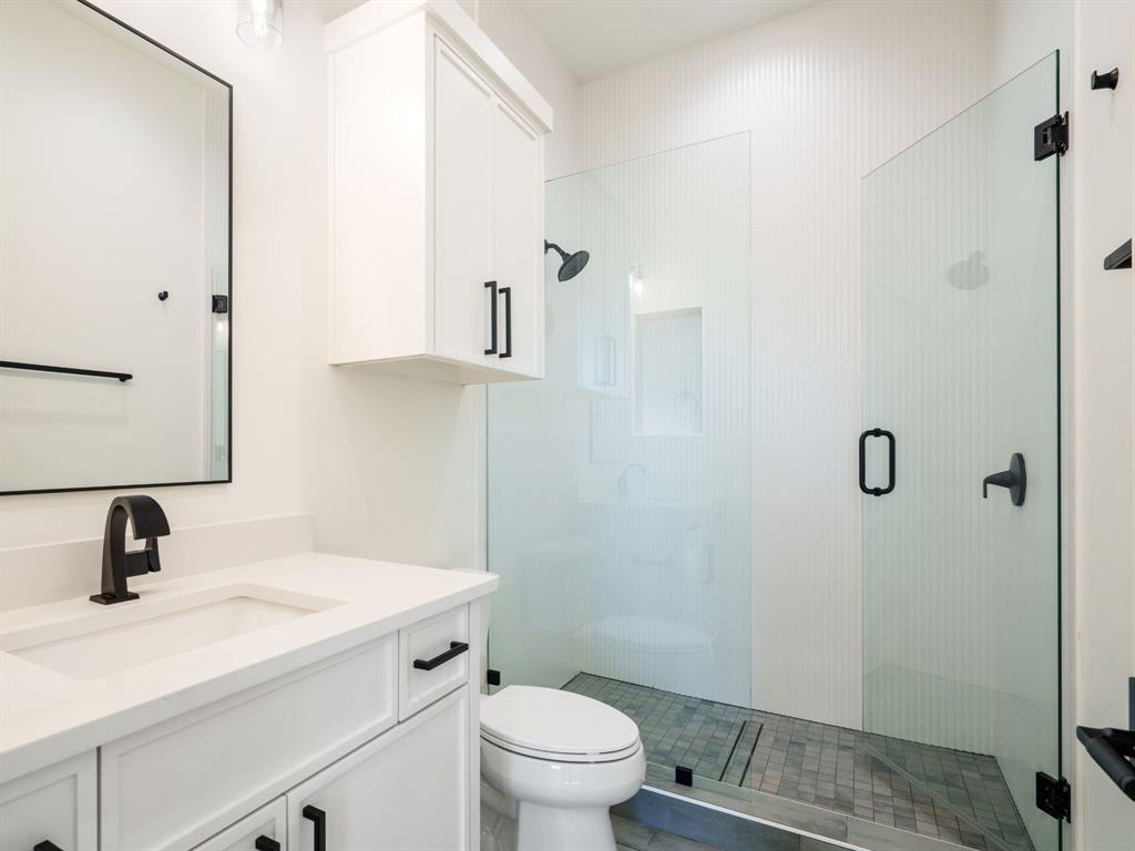 4010 Sperry Street Dallas, TX 75214 - Photo 33 of 40 Full bath featuring vanity and a shower stall