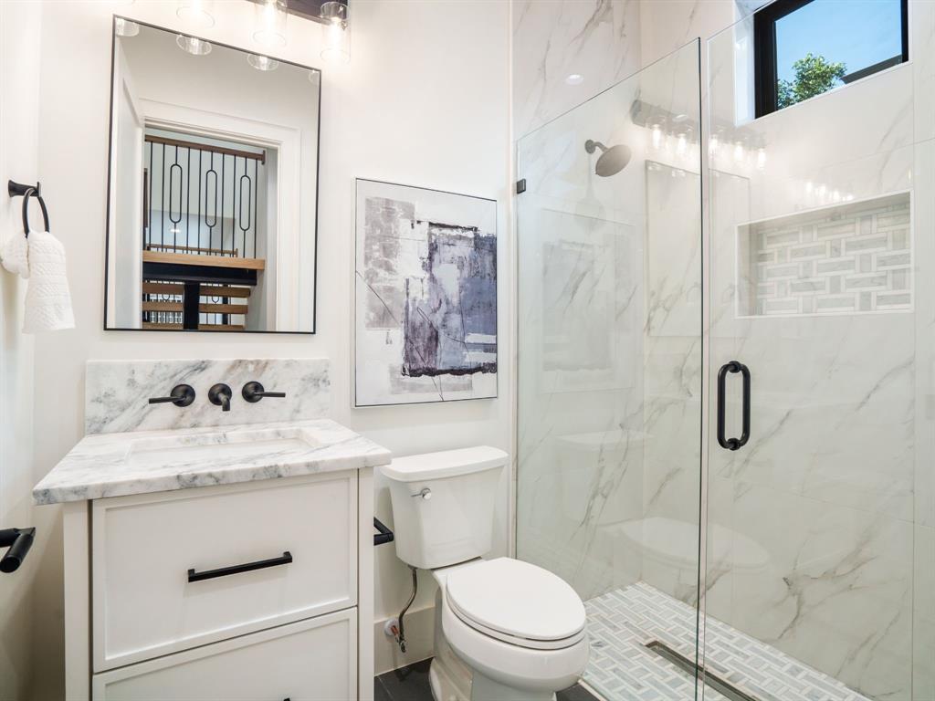 4010 Sperry Street Dallas, TX 75214 - Photo 36 of 40 Full bath with vanity and a marble finish shower