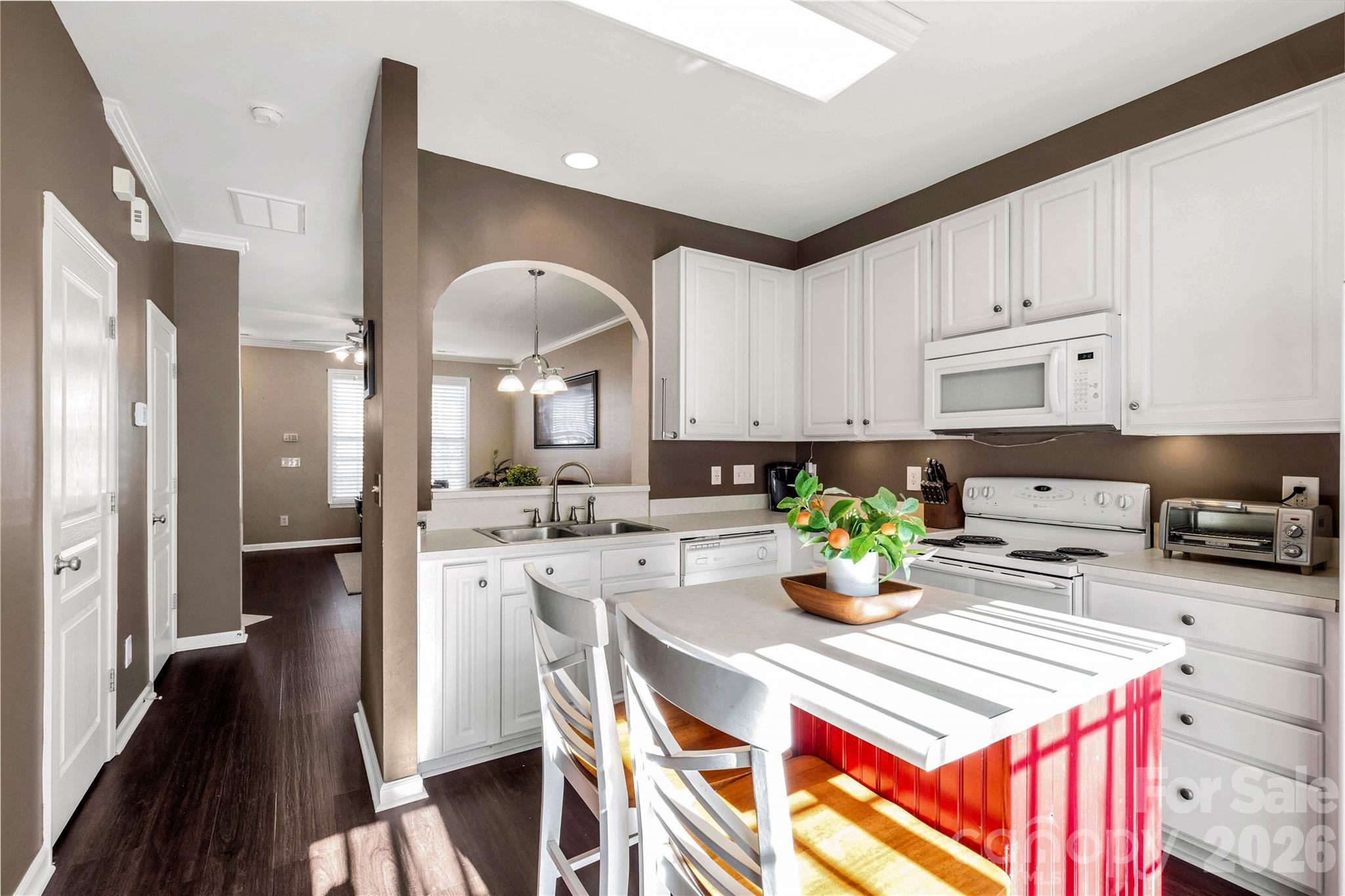 960 Copperstone Lane Fort Mill, SC 29708 - Photo 11 of 29 a kitchen with a sink a stove and cabinets