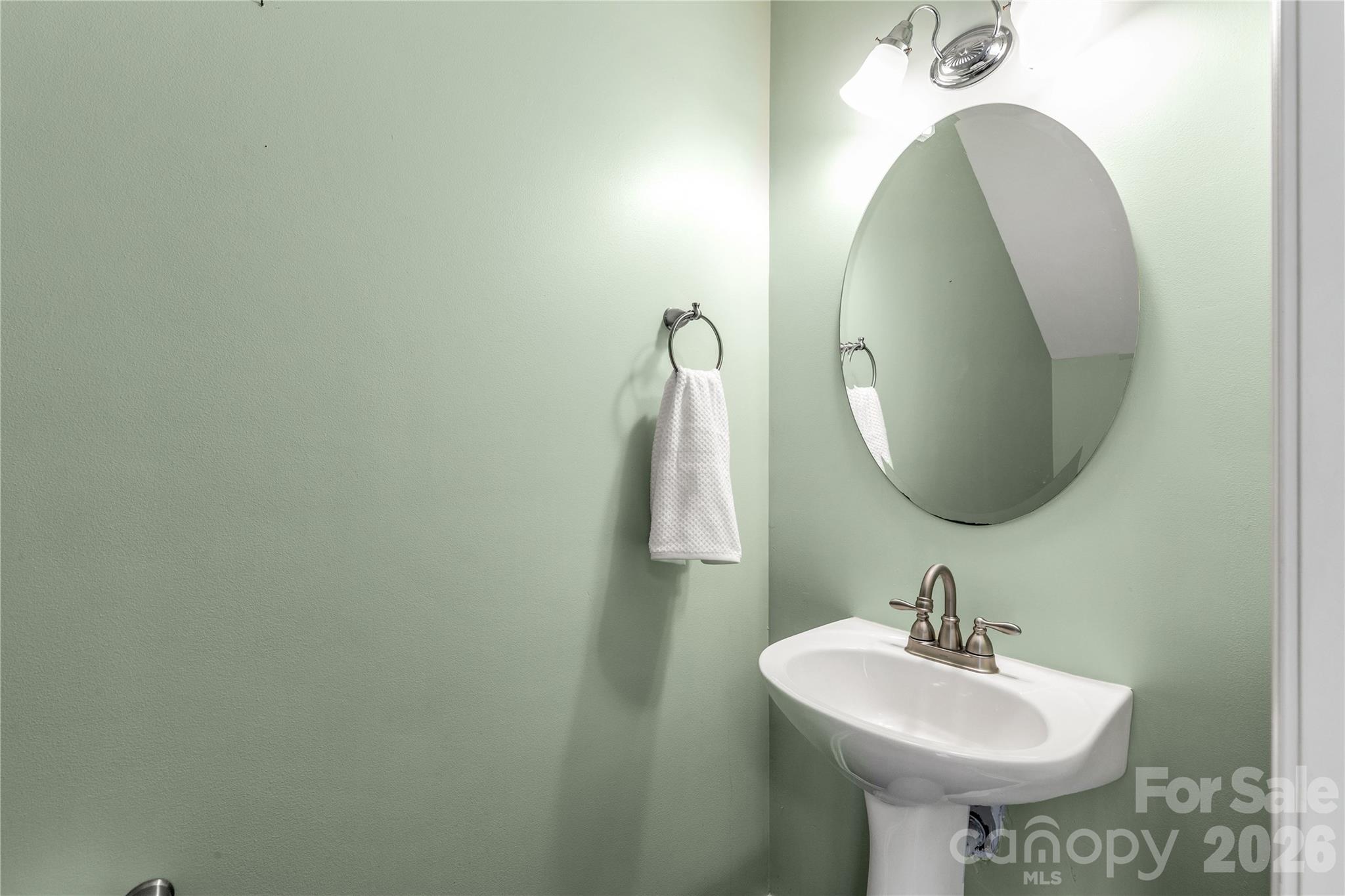 960 Copperstone Lane Fort Mill, SC 29708 - Photo 14 of 29 a bathroom with a sink and mirror