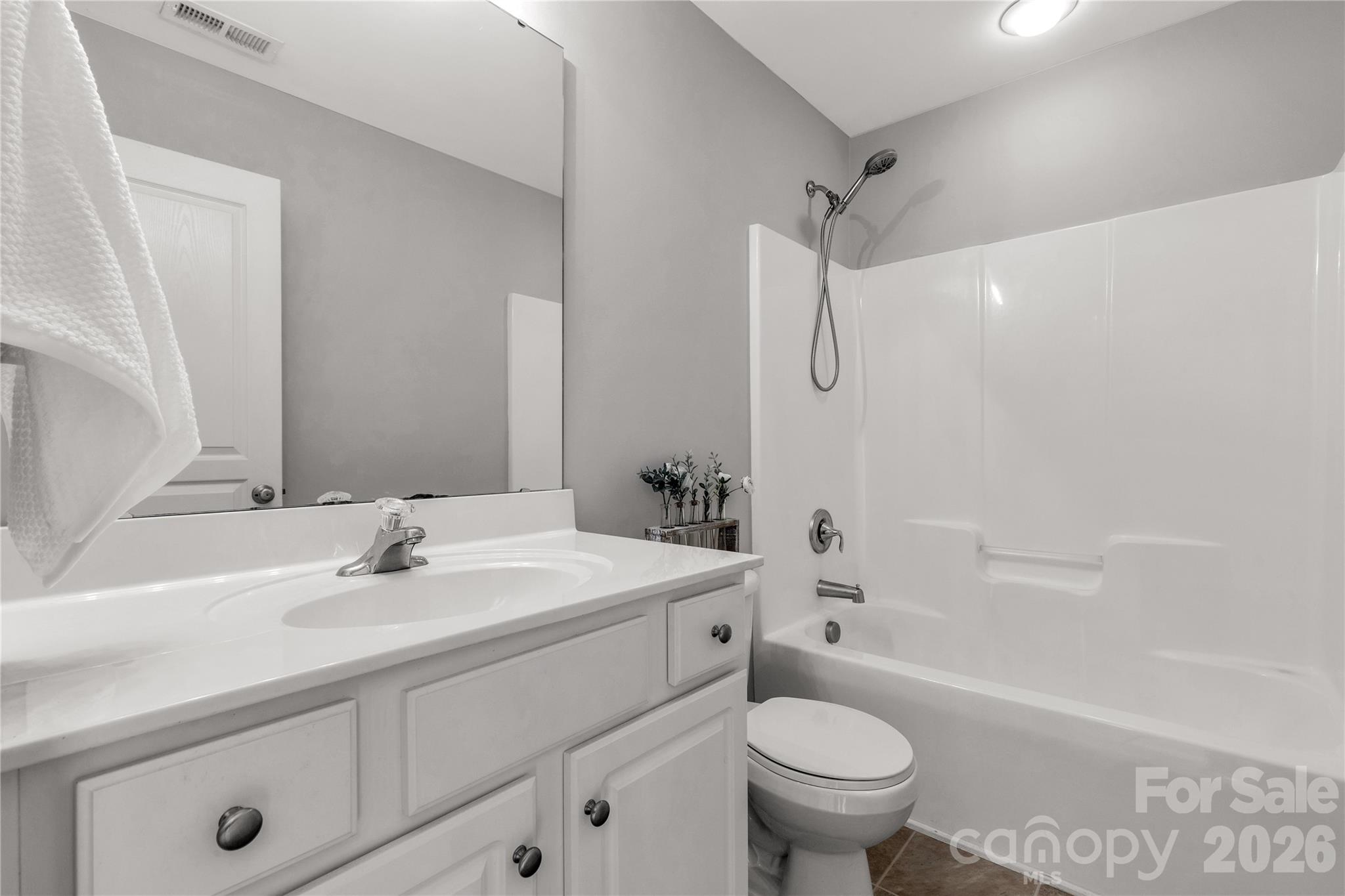 960 Copperstone Lane Fort Mill, SC 29708 - Photo 20 of 29 a bathroom with a sink toilet vanity and shower