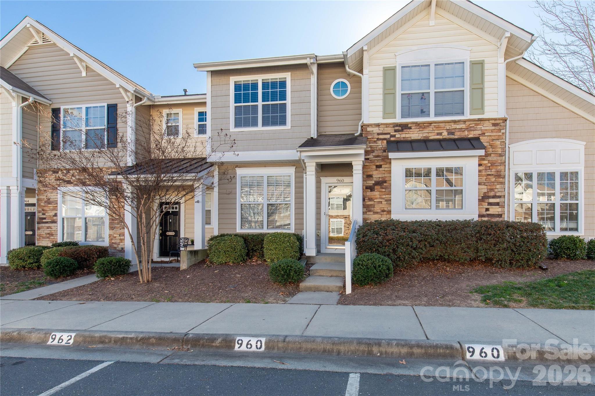 960 Copperstone Lane Fort Mill, SC 29708 - Photo 2 of 29 a front view of a house with garden and plants