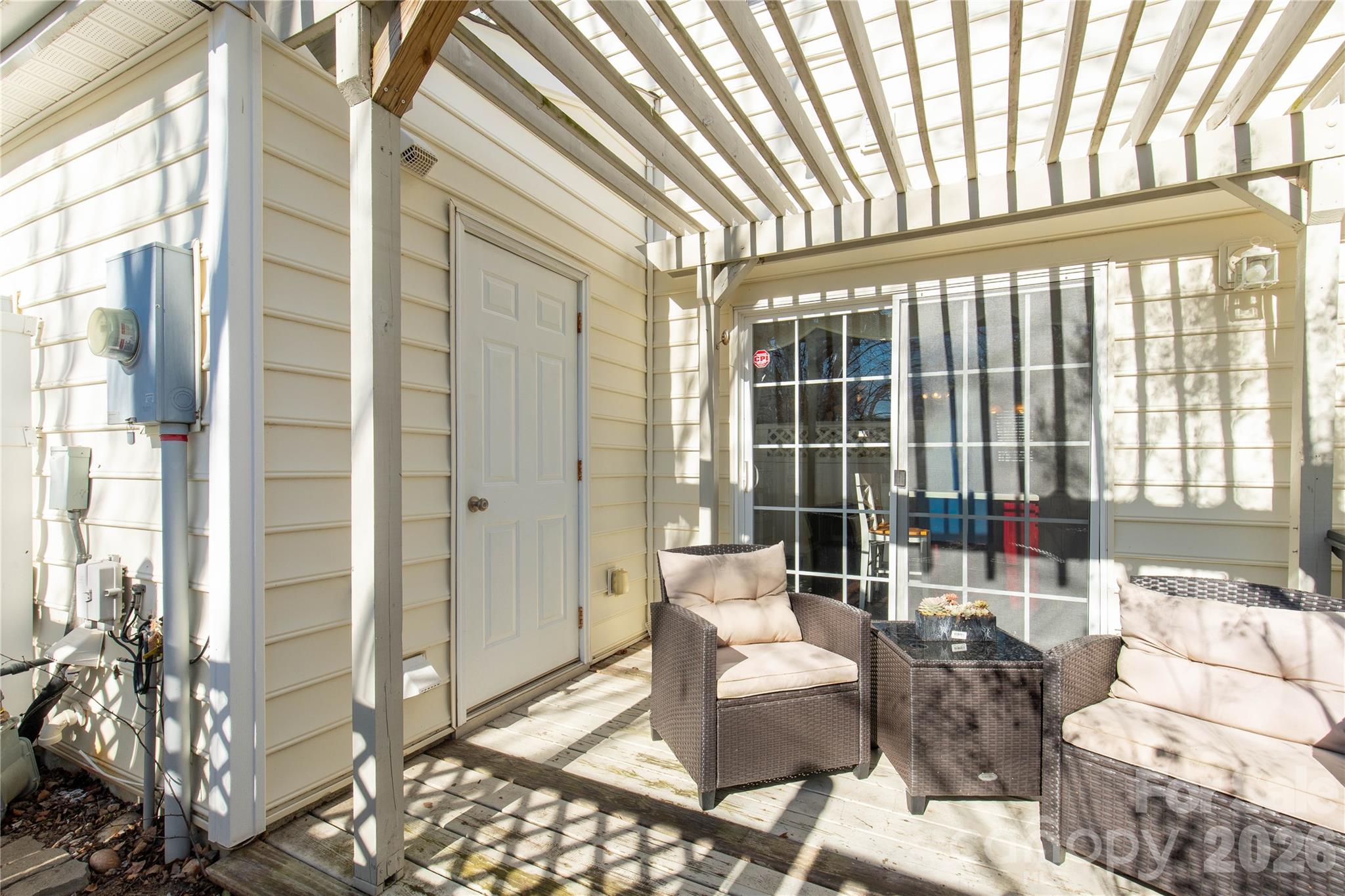 960 Copperstone Lane Fort Mill, SC 29708 - Photo 22 of 29 a living room with furniture and a floor to ceiling window