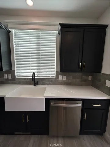 a room with a sink and a window