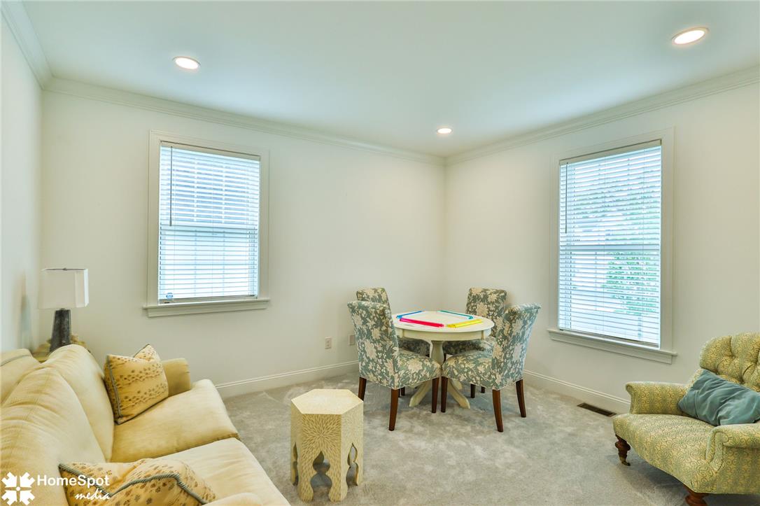 4473 Old Saucon Road Bethlehem, PA 18015 - Photo 10 of 26 Sunlight streams through large windows into this versatile bonus space with plush carpeting.