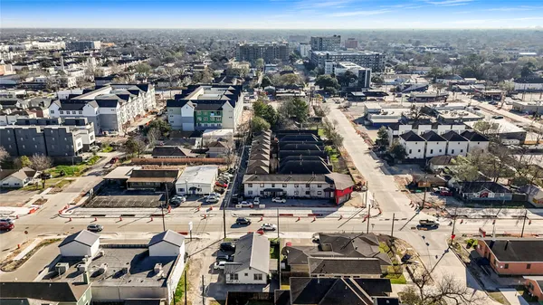 an aerial view of a city with lots of residential buildings