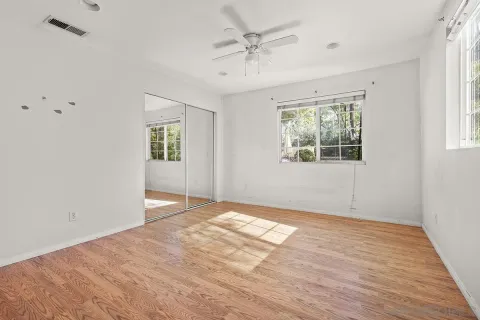 a bathroom with a shower and a sink
