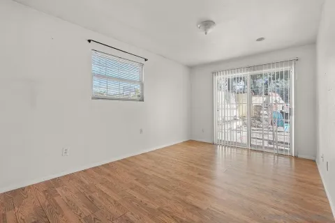 a view of an chairs and tables in the patio