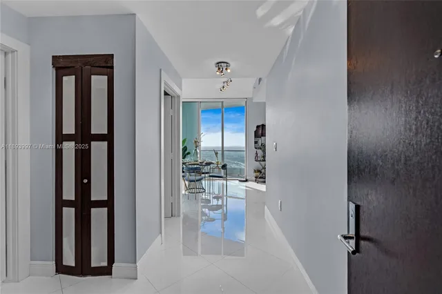 a view of entryway with livingroom