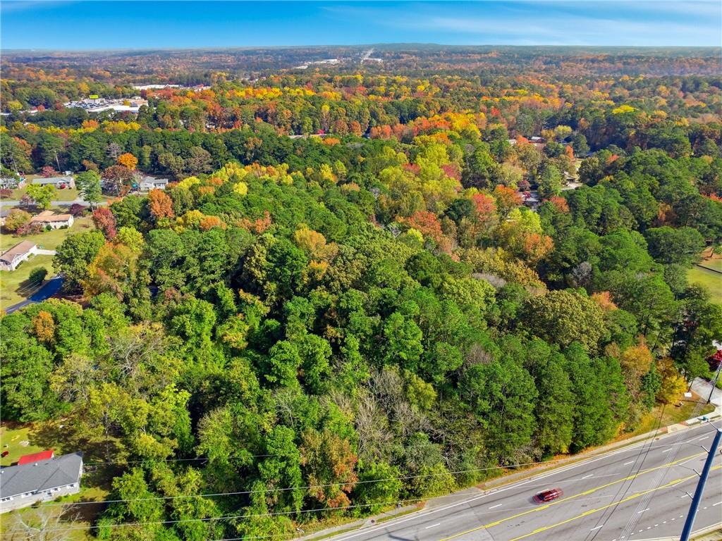 2234 Rockbridge Road Southwest Stone Mountain, GA 30087 - Photo 4 of 6 an aerial view of residential houses with city view
