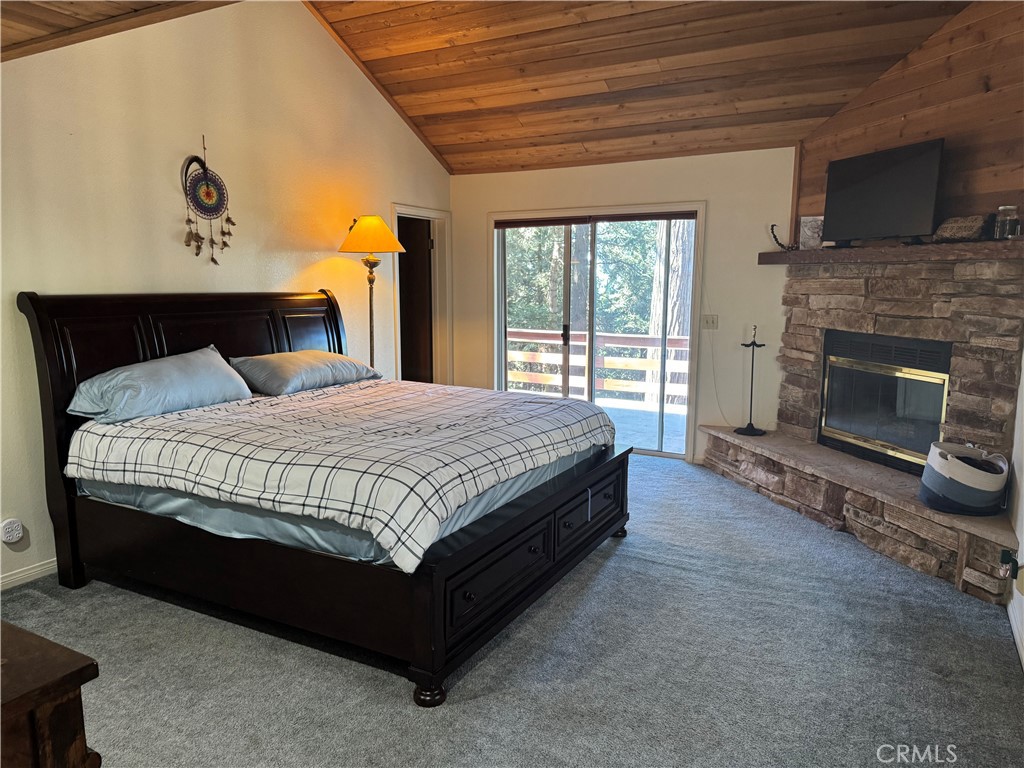 21564 Jobs Peak Road Cedarpines Park, CA 92322 - Photo 22 of 25 Master Bedroom with Fireplace and upper deck