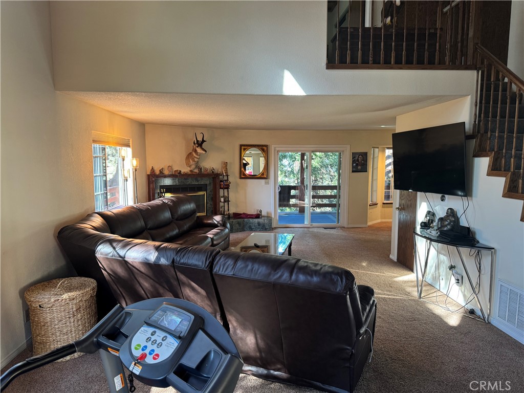 21564 Jobs Peak Road Cedarpines Park, CA 92322 - Photo 10 of 25 Living room with a Fireplace