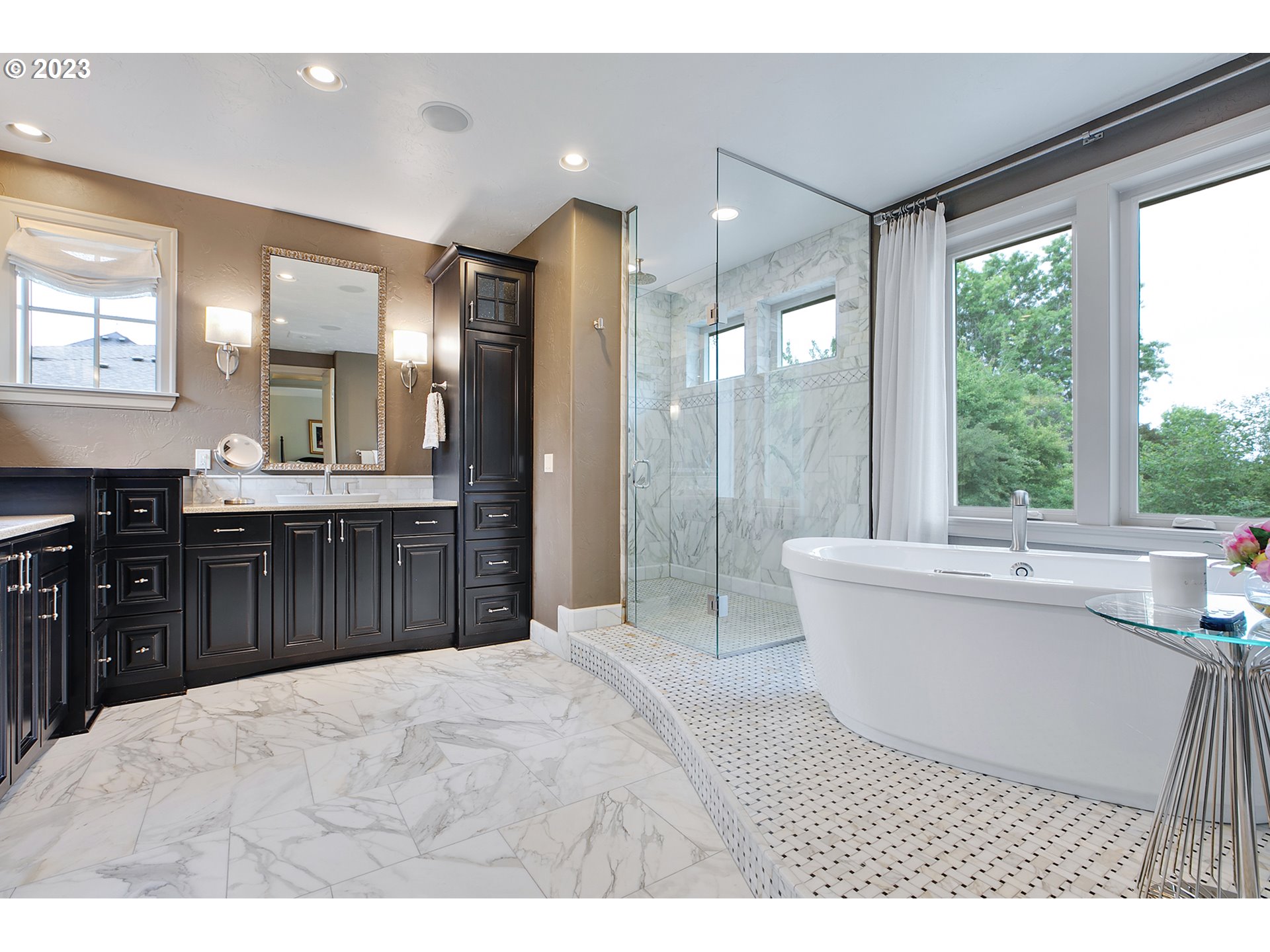 14051 155th Terrace Portland, OR 97224 - Photo 26 of 48 a bathroom with a tub sink shower and mirror