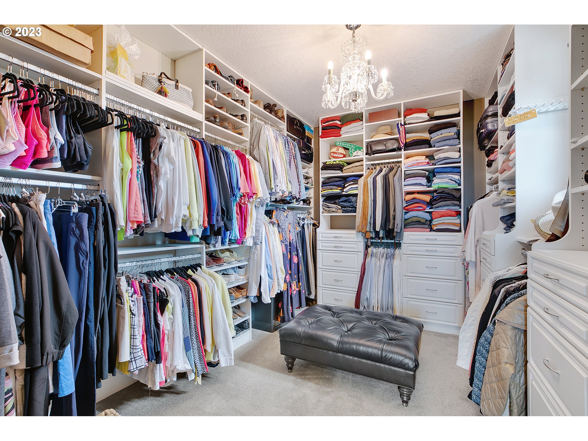 14051 155th Terrace Portland, OR 97224 - Photo 28 of 48 a view of walk in closet with clothes