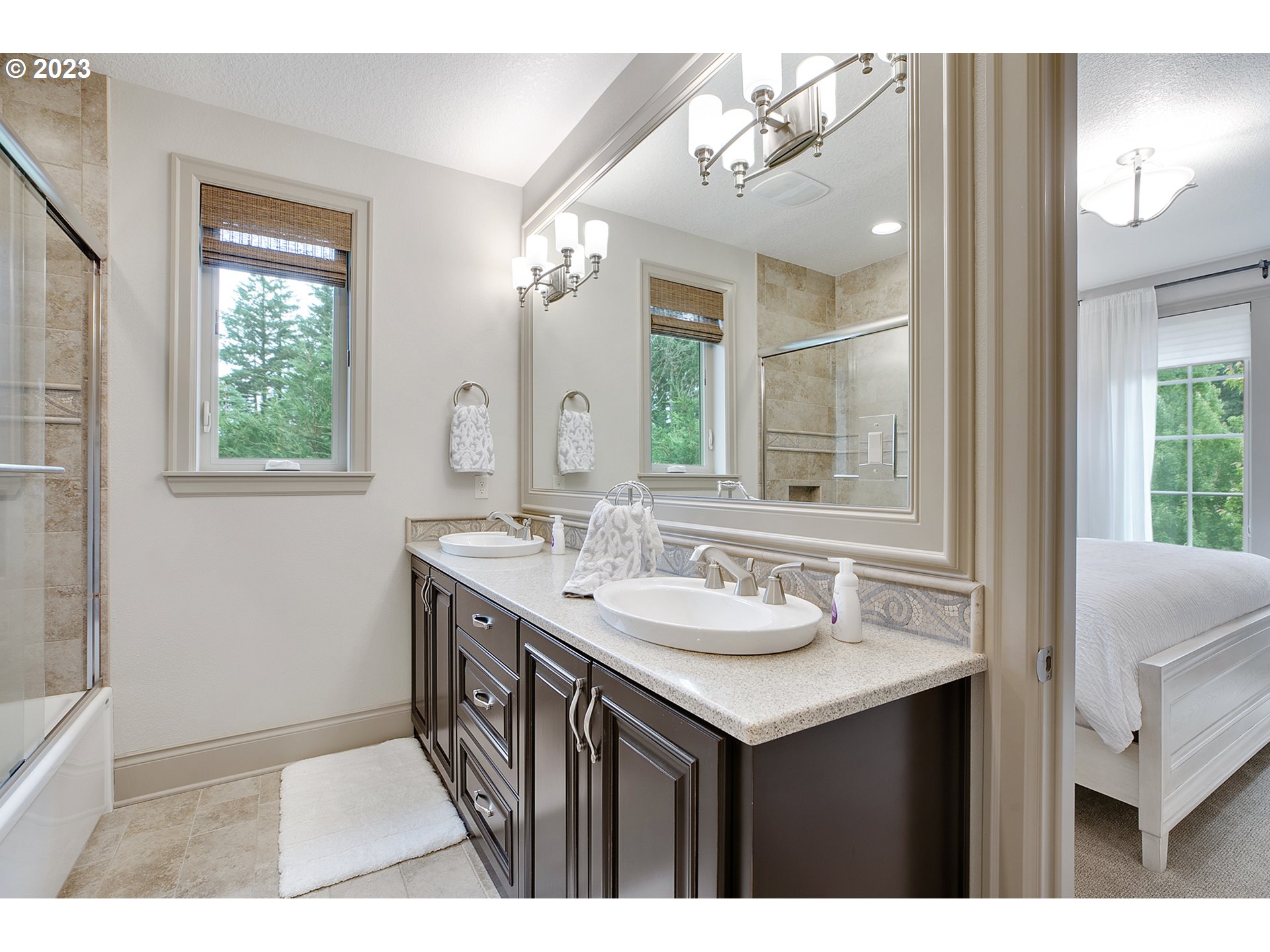 14051 155th Terrace Portland, OR 97224 - Photo 33 of 48 a bathroom with a sink a vanity and a mirror