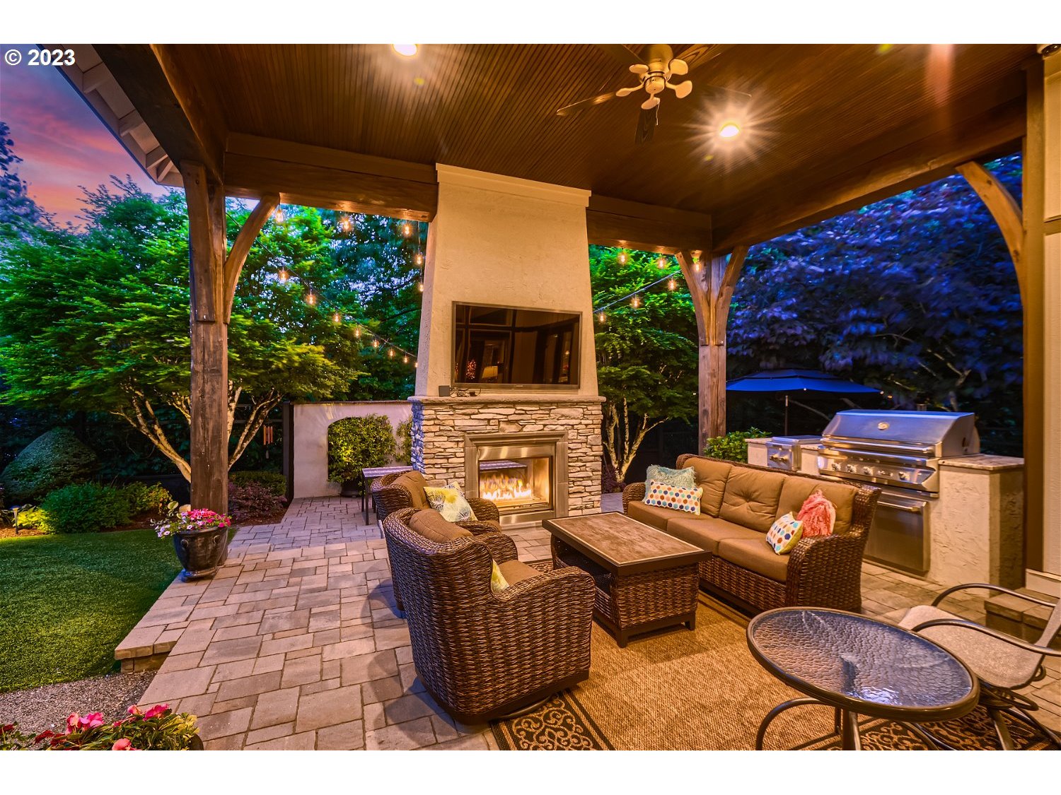 14051 155th Terrace Portland, OR 97224 - Photo 46 of 48 a view of a patio with table and chairs with wooden floor and fence