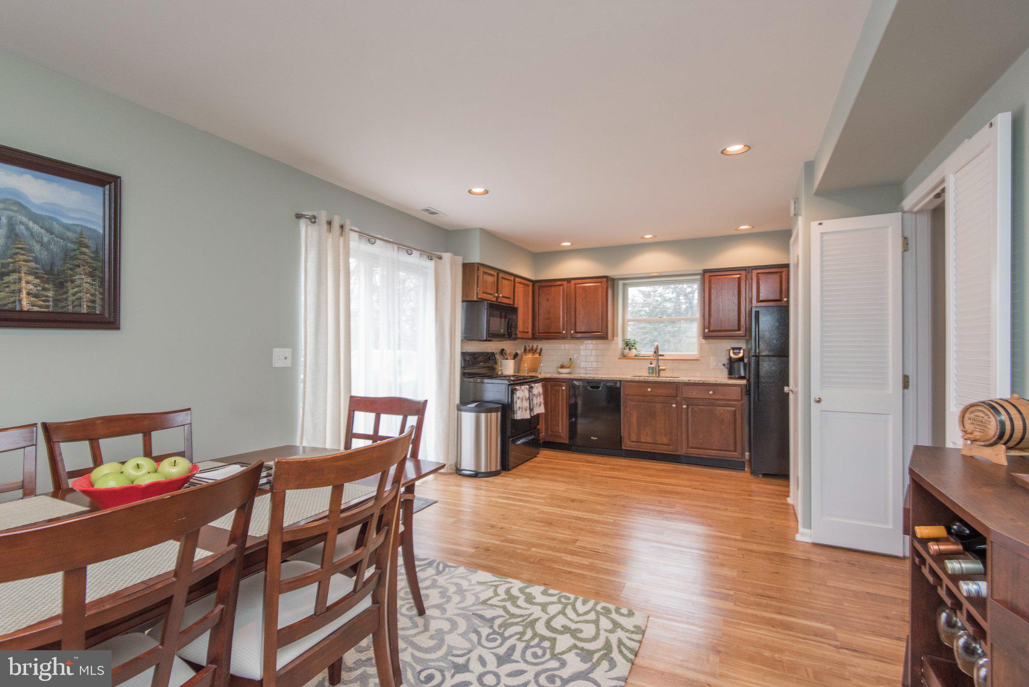 650 North Valley Forge Road Devon, PA 19333 - Photo 18 of 38 Inviting kitchen with warm wood tones.