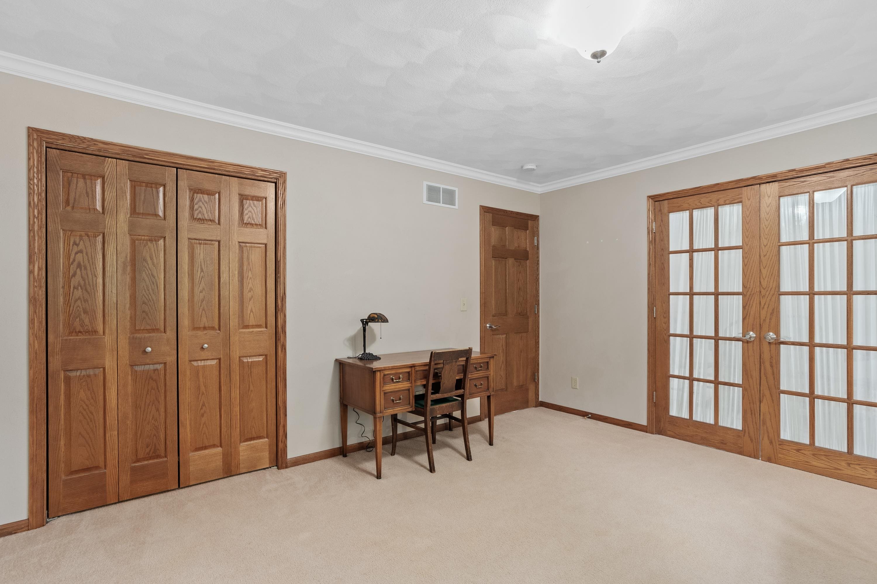 13294 Weatherfield Way Roscoe, IL 61073 - Photo 15 of 38 a view of a livingroom with furniture and entryway
