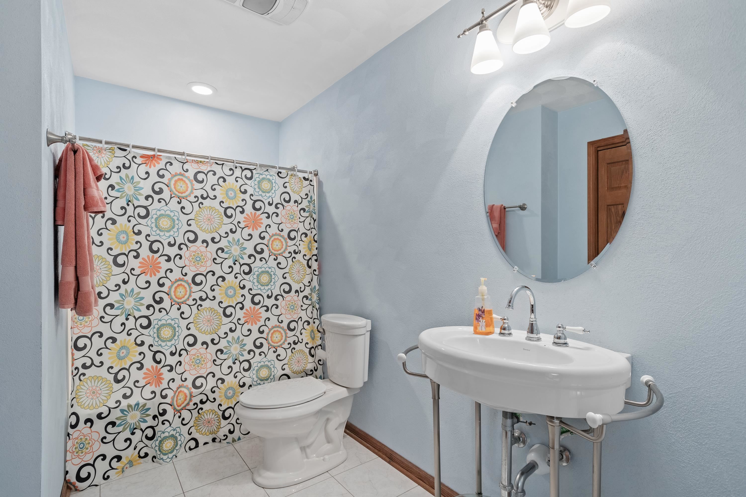 13294 Weatherfield Way Roscoe, IL 61073 - Photo 16 of 38 a bathroom with a sink toilet and shower