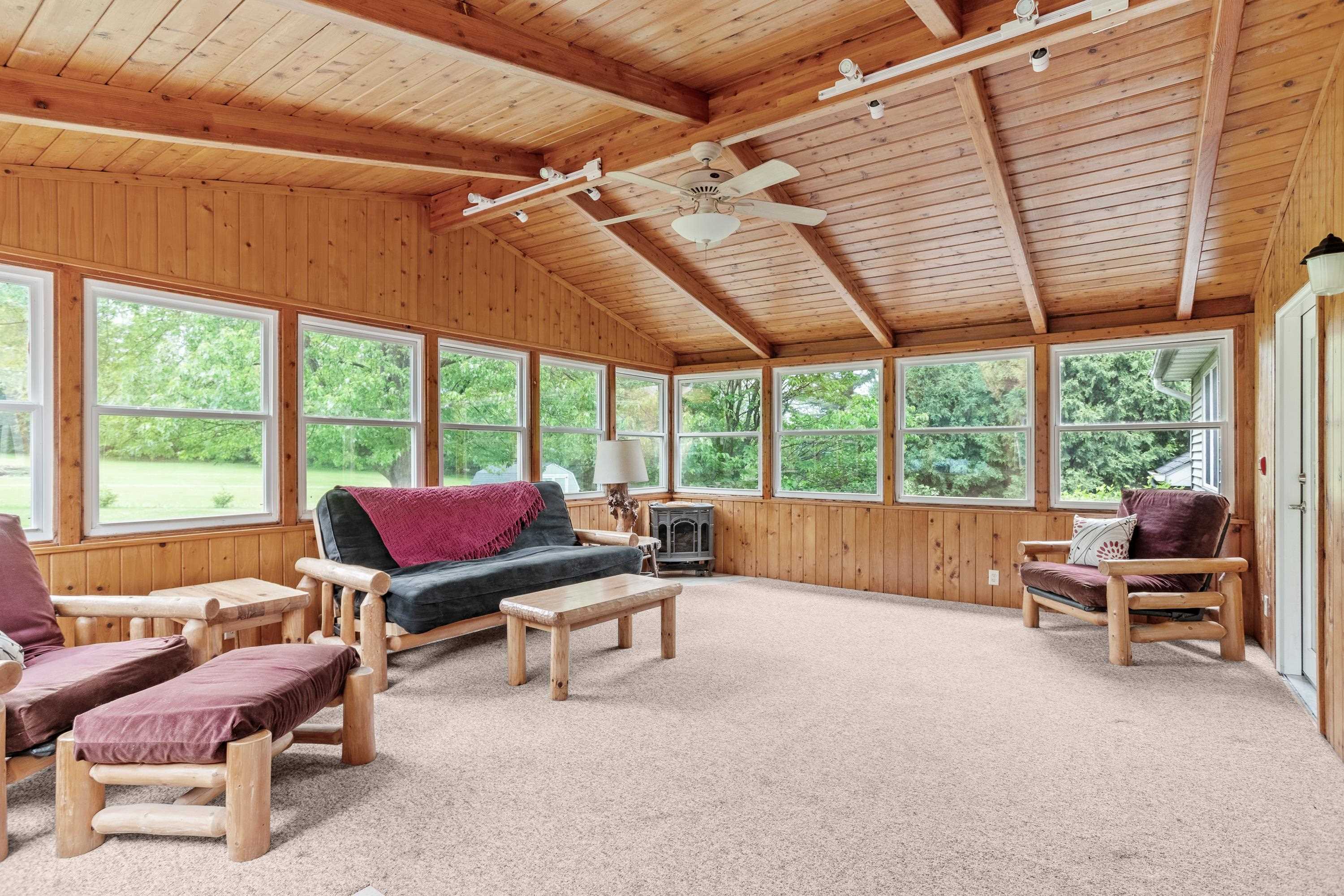 13294 Weatherfield Way Roscoe, IL 61073 - Photo 22 of 38 a living room with furniture and a window