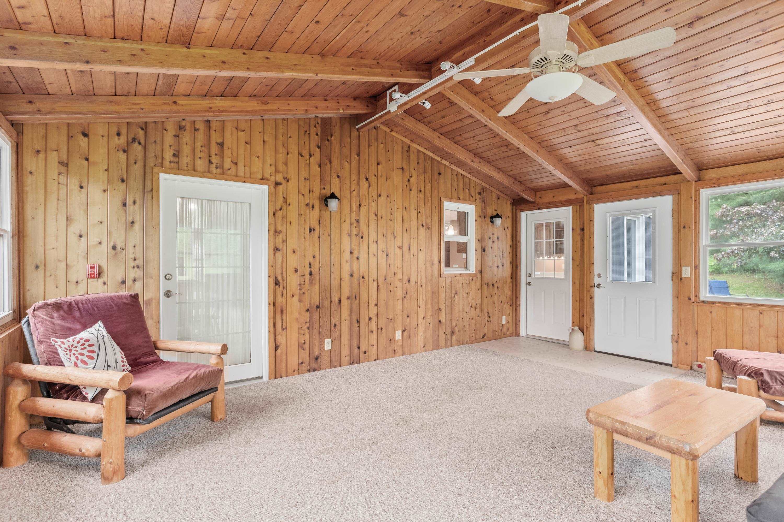 13294 Weatherfield Way Roscoe, IL 61073 - Photo 23 of 38 a bedroom with furniture and a ceiling fan