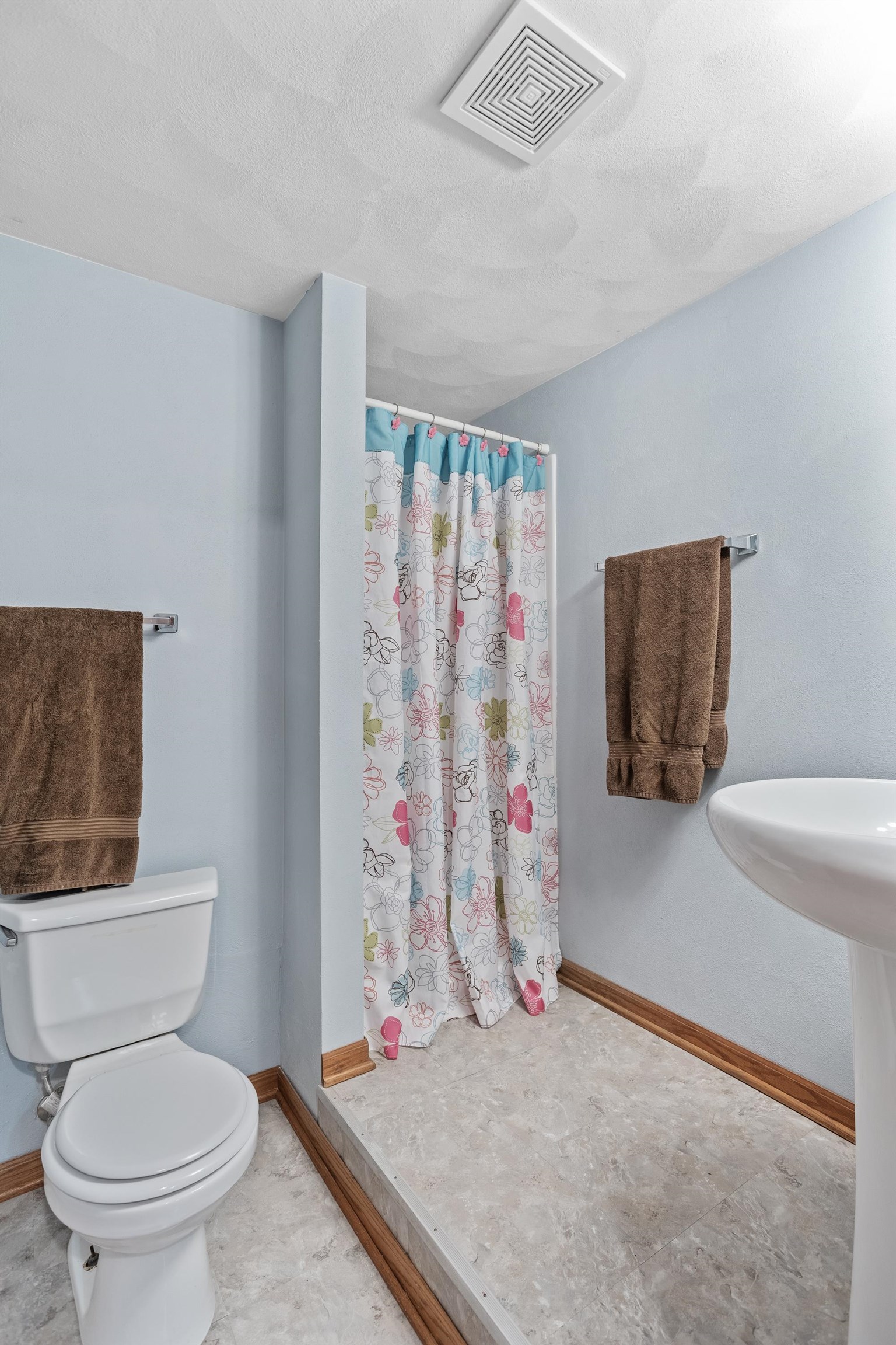13294 Weatherfield Way Roscoe, IL 61073 - Photo 34 of 38 a bathroom with a toilet and a shower curtain