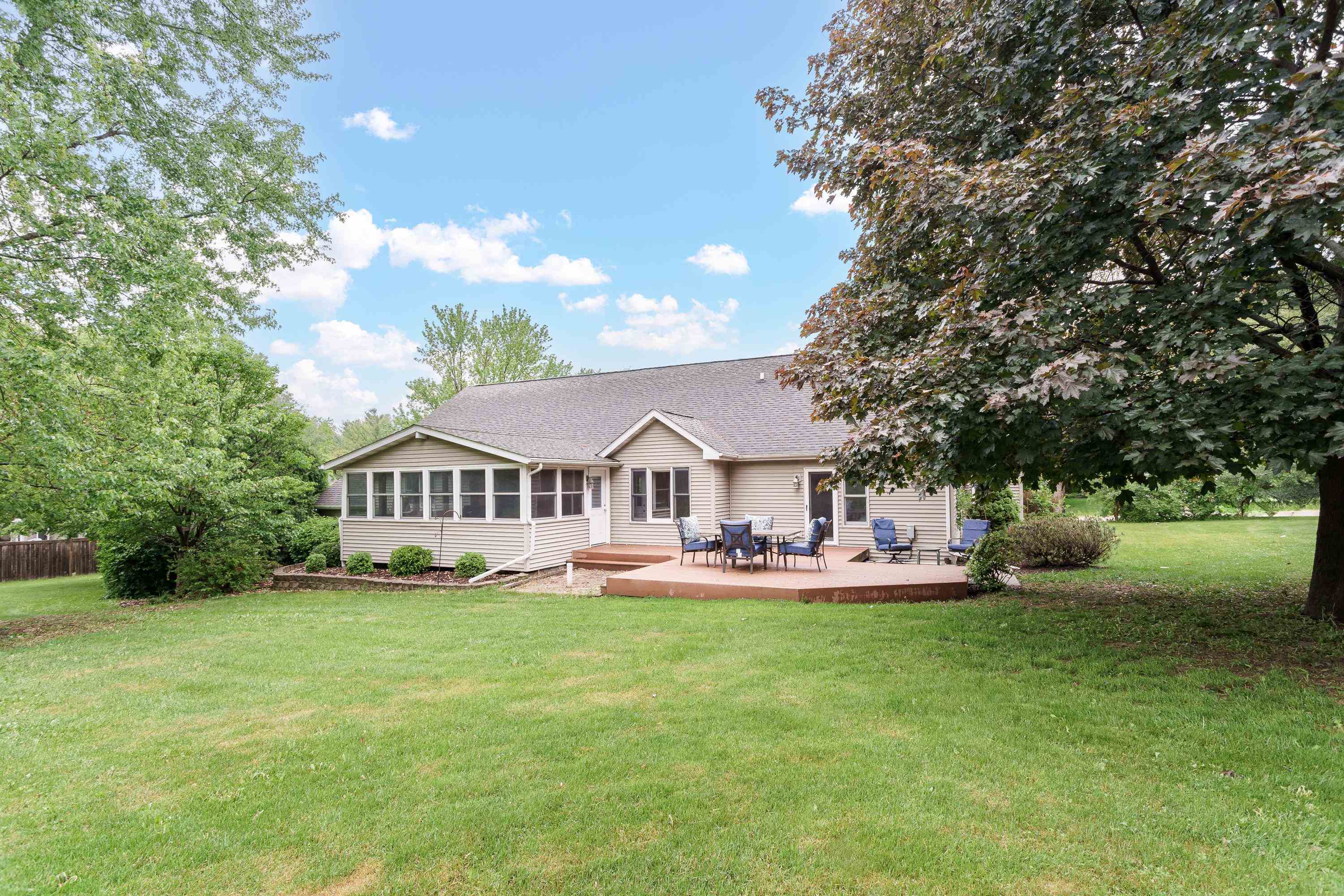 13294 Weatherfield Way Roscoe, IL 61073 - Photo 5 of 38 a front view of a house with garden