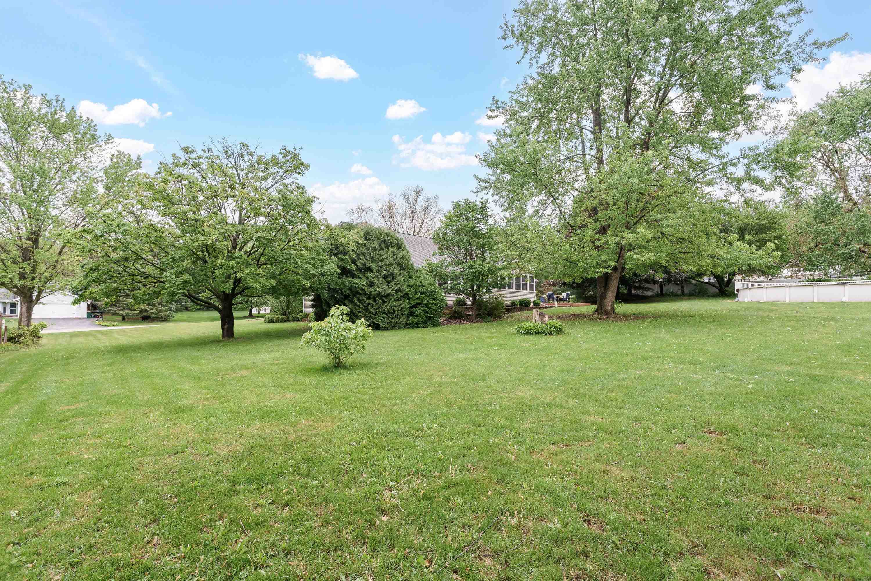 13294 Weatherfield Way Roscoe, IL 61073 - Photo 8 of 38 a view of a park with large trees