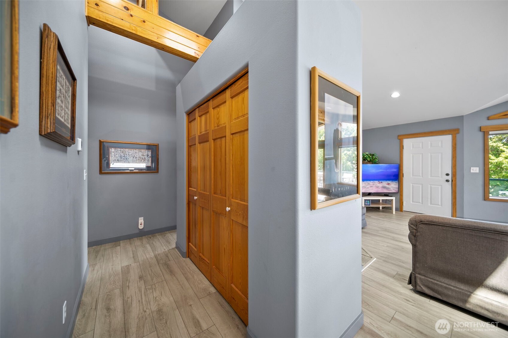 105 Chelan View Drive Manson, WA 98831 - Photo 12 of 40 a view of a hallway view with wooden floor and staircase