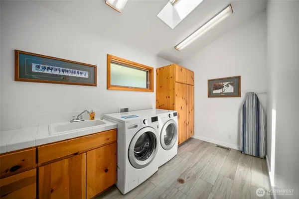 a utility room with dryer and washer