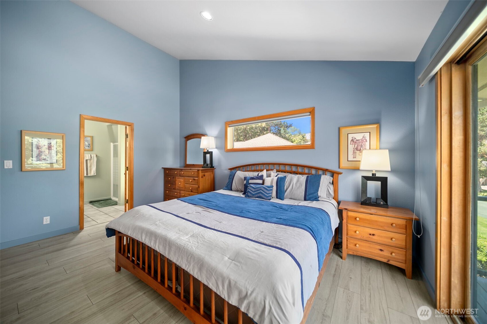 105 Chelan View Drive Manson, WA 98831 - Photo 19 of 40 a bedroom with a bed and wooden floor