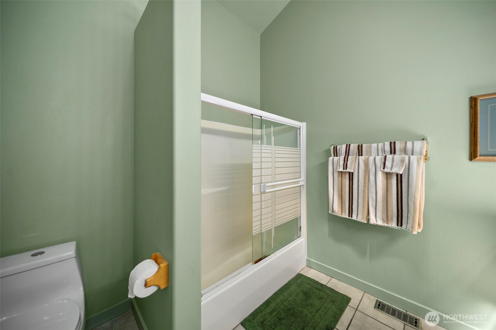 105 Chelan View Drive Manson, WA 98831 - Photo 22 of 40 a bathroom with a window and a shower