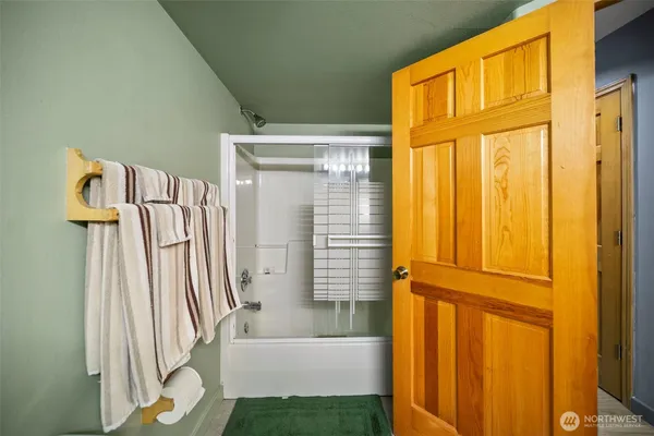 a bathroom with a sink and a shower