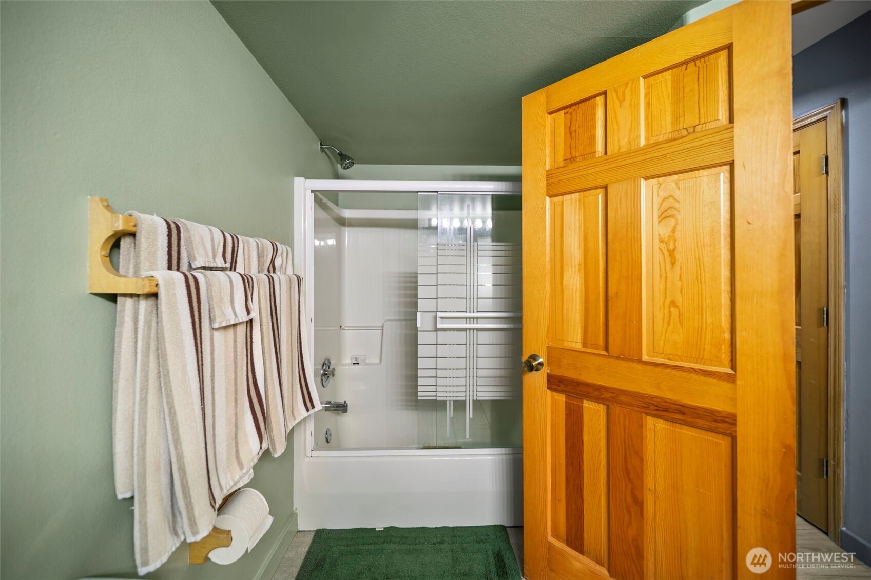 105 Chelan View Drive Manson, WA 98831 - Photo 30 of 40 a bathroom with a sink and a shower