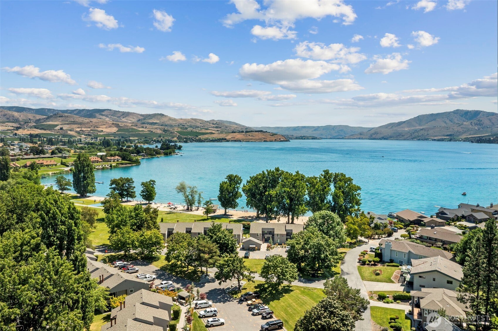 105 Chelan View Drive Manson, WA 98831 - Photo 40 of 40 a view of a lake with a mountain