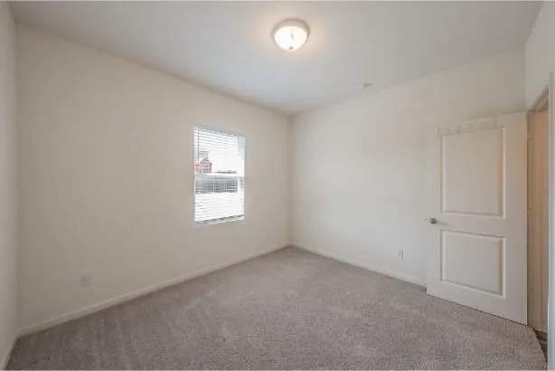 an empty room with a window