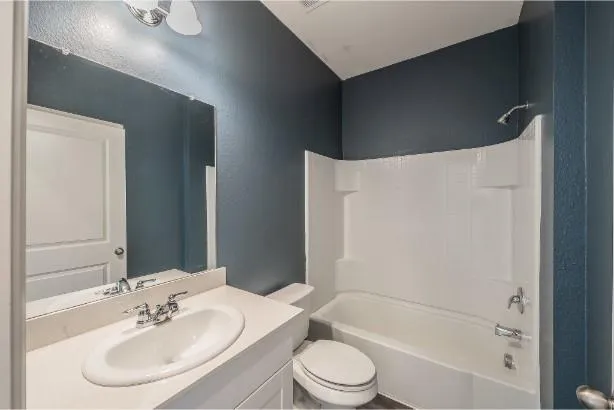 a house view with swimming pool in front of it